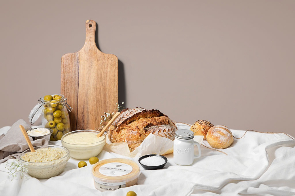 A generous spread of Homespread sourdough, rolls and homemade dips